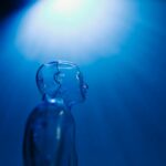 clear mannequin on dark blue background